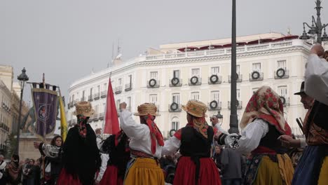 Traditional dance performance during Madrid's Transhumance Festival in Plaza de Sol with colorful costumes