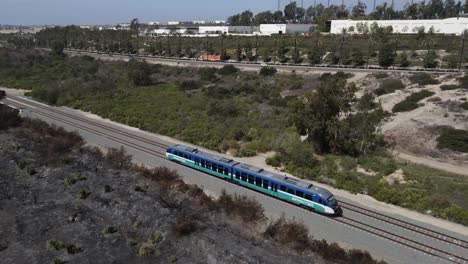 Aerial-view-of-Oceanside-sprinter-train,-oceanside-boulevard