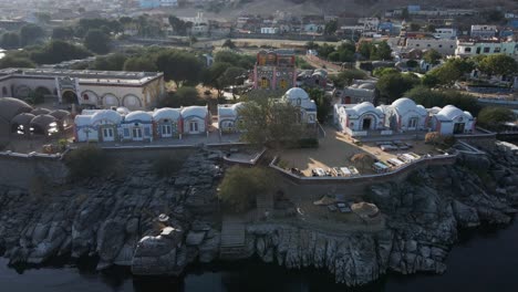 a colorful nubian hotel on the nile river