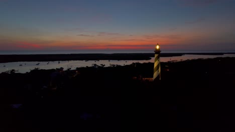 painted sky backdrop with boats along the coastal inlet in saint augustine florida in the early morning