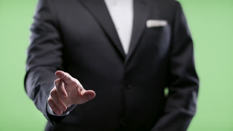 businessman using augmented reality touch display. shot on green screen in 4k.