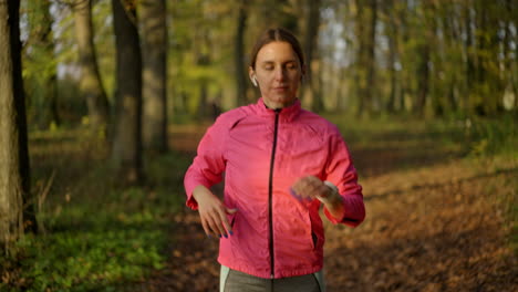 woman jogging in an autumn park