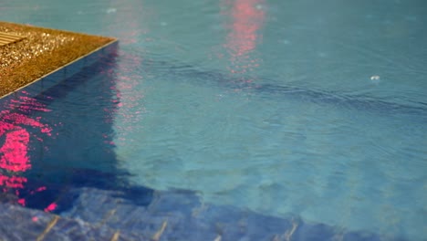 swimming pool stairs, rain drops