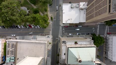 Overhead-drone-view-of-intersection-in-downtown-Mobile,-Alabama-with-video-stable