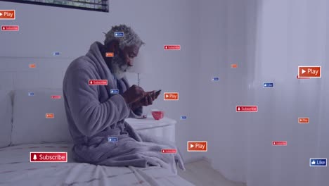 animation of media icons over senior african american man using smartphone