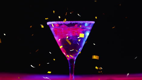 animation of confetti falling and cocktail on black background