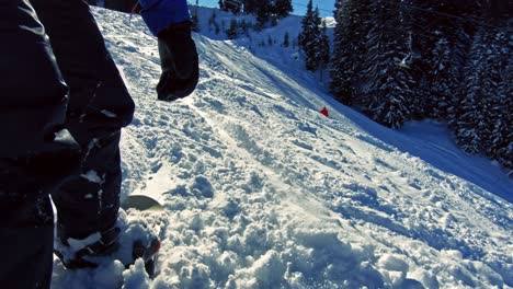 a snowboarder going down the slope