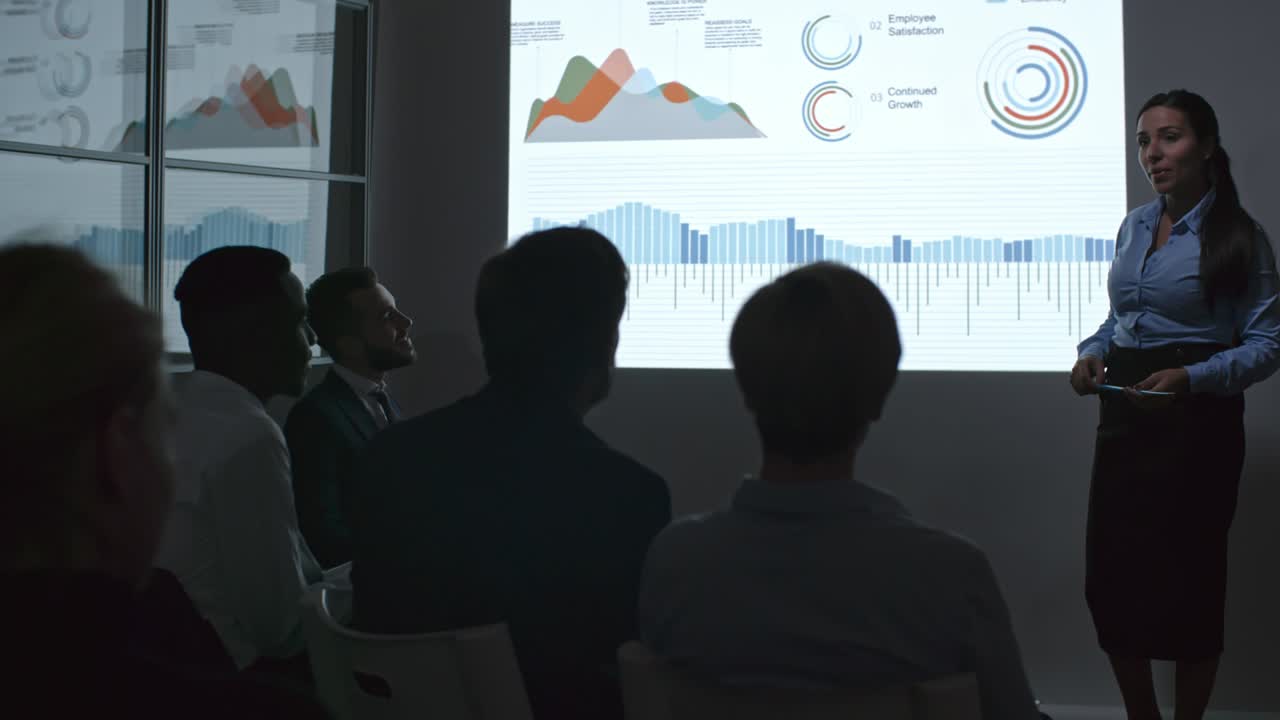 Colleagues Discussing Business Presentation