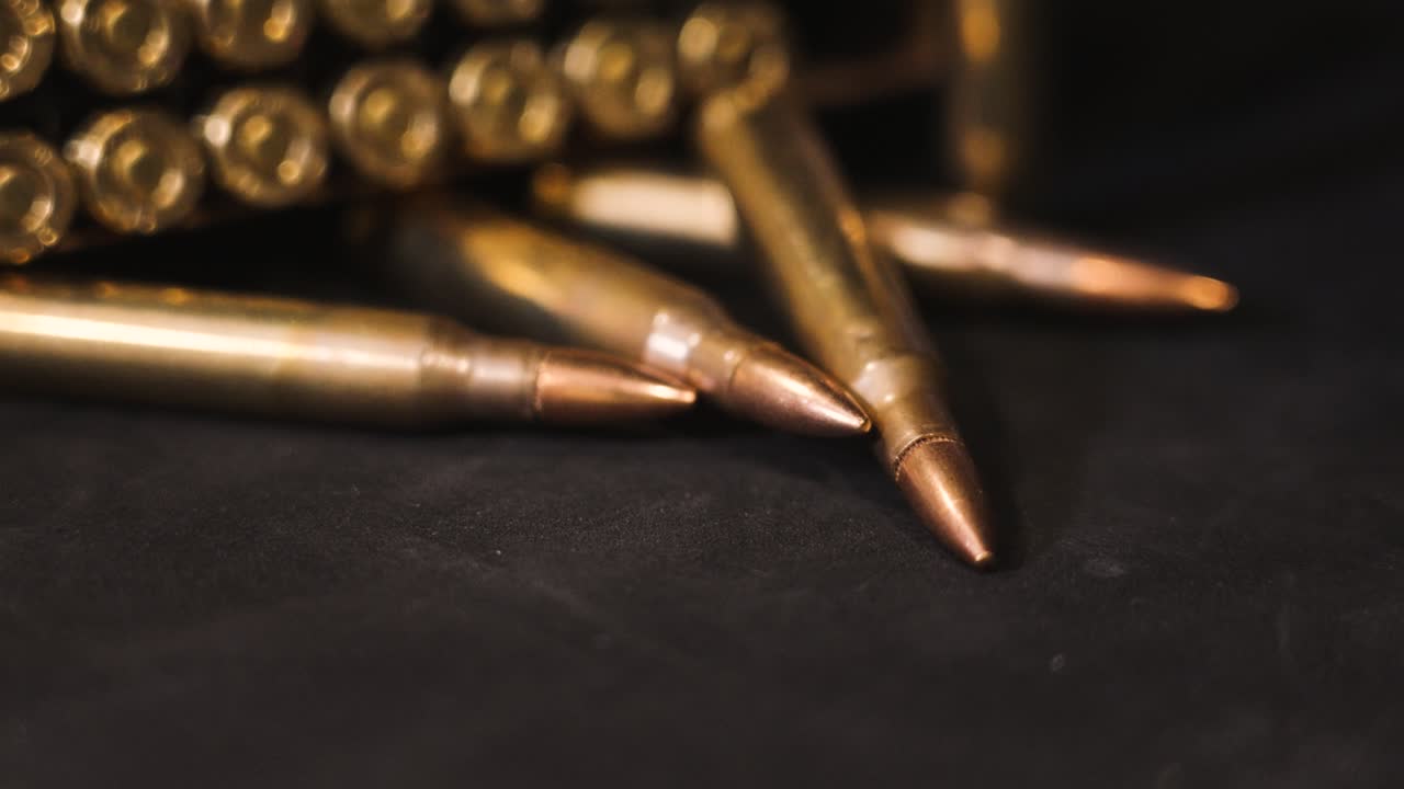 Close-up of Rifle Cartridges and Ammo Box