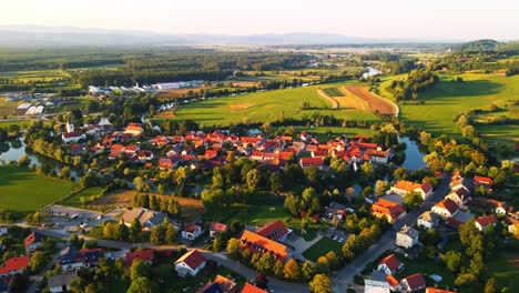 Stunning-aerial-4K-drone-footage-of-Kostanjevica-na-Krki-in-the-golden-sunset-light