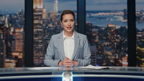cheerful lady announcer talking news at studio closeup. woman ending broadcast