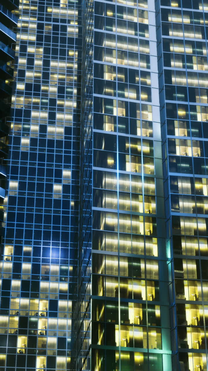 Nighttime cityscape showcasing illuminated skyscrapers in a bustling metropolis