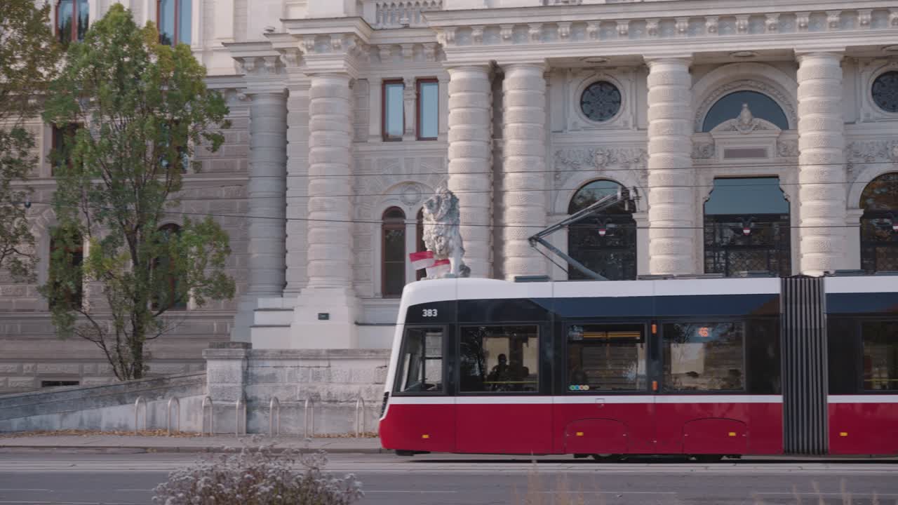 A red and black tram in Vienna, Austria