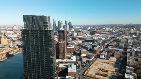 Cinematic-Establishing-Shot-Reveals-Long-Island-City-Skyline-on-Beautiful-Day-from-Brooklyn