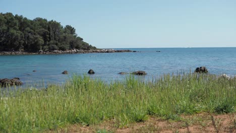 A tranquil lake scene in Croatia, reflecting the peaceful natural surroundings and clear skies