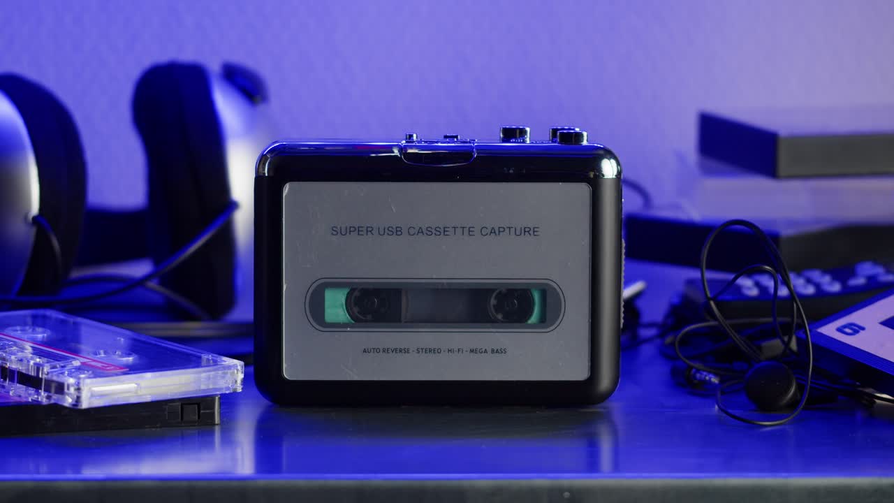 Vintage cassette player on a desk with headphones and tapes creates a nostalgic audio scene, evoking retro vibes