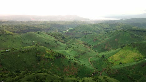 epic aerial mountain scenery of agricultural land ready for cultivation maize corn in eastern sumbawa island, indonesia