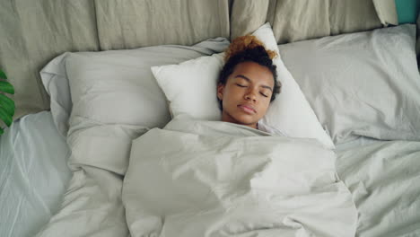 woman sleeping in bed