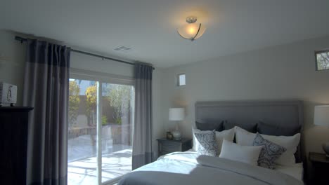 las vegas nevada's modern interior design of a master bedroom with a glass window that let sunlight take in - close up shot