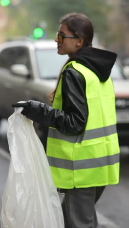 woman cleaning street