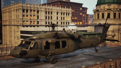 military helicopter on city rooftop at dusk