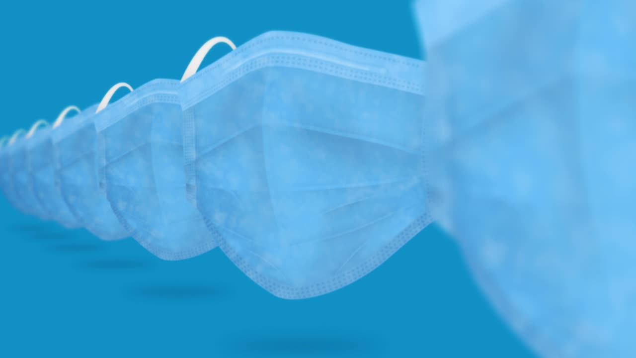 바이러스로부터 보호하기 위해 입과 코를 는 많은 의료 마스크. 건강 관리 개념. 3d 현실적인 의료 마스크, 루프 애니메이션.