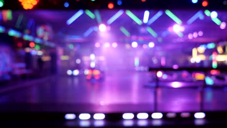 steady wide shot of blurred bumper car lights at carnival festival,real time