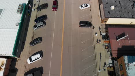 Aerial-of-street-with-cars-at-West-Yellowstone,-located-near-the-west-entrance-of-Yellowstone-National-Park,-an-popular-destination-with-a-rich-history-and-a-variety-of-attractions-and-activities