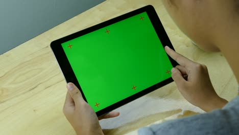 woman using horizontal tablet