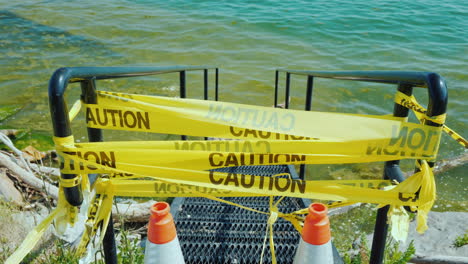 locked entrance to the marina or beach flooding and sea level rise