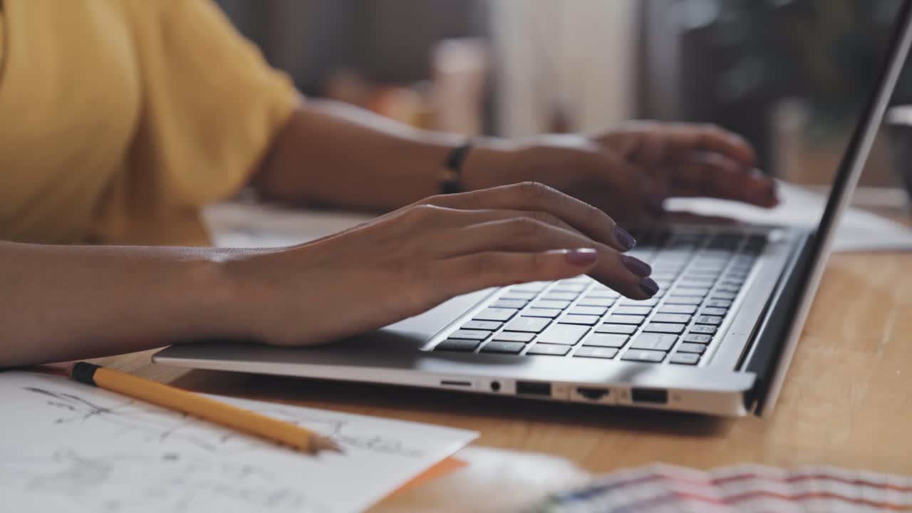 Hands of Female Designer Typing on Laptop