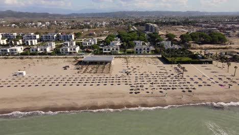 Panoramic-aerial-view-of-beach-in-Bay-of-Lalzi-along-the-Albanian-coastline,-Europe