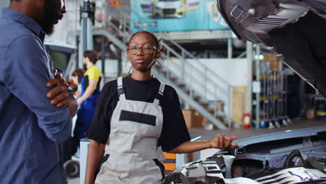 Mechanic-in-garage-fixes-customers-car