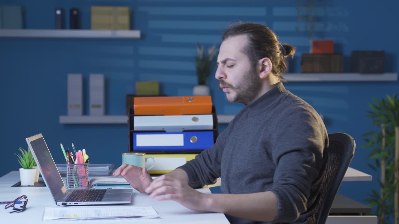 Businessman with sore and burning eyes taking a break.