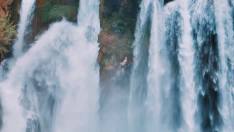 powerful waterfall in a lush forest