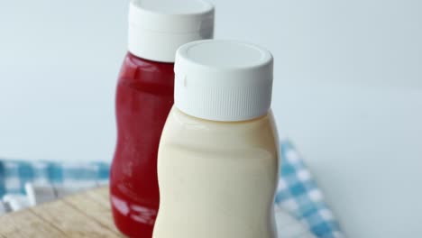 close up of mayonnaise in container on table