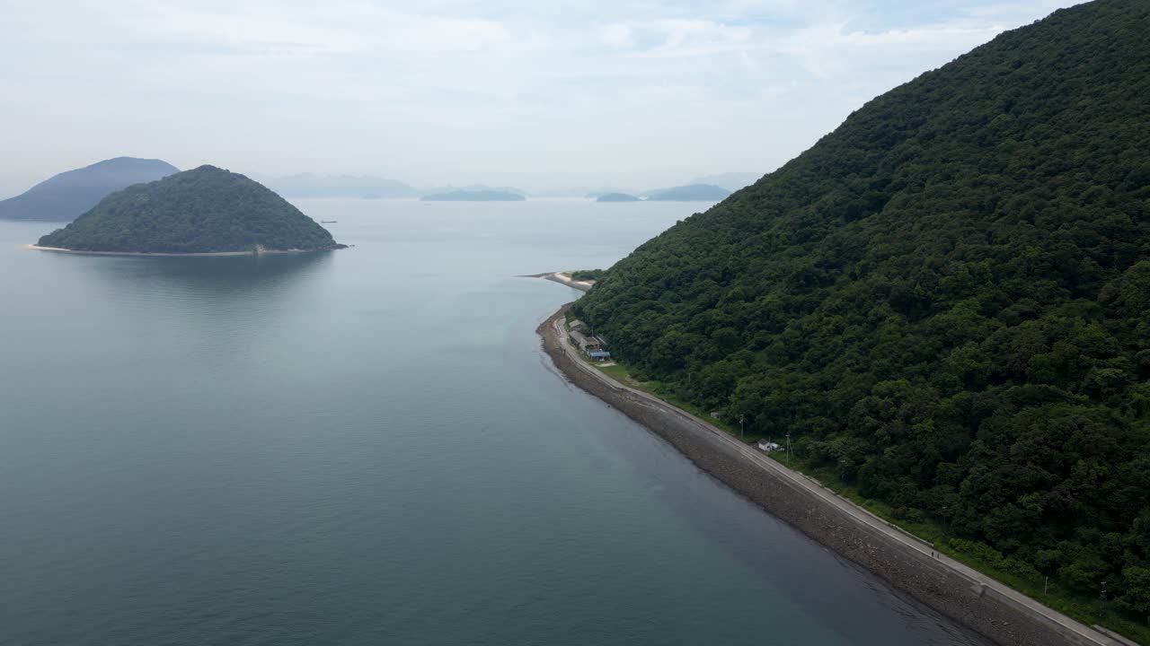 Slow motion drone flight over Sanagi Cat Island