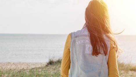 woman enjoying the beach scenery