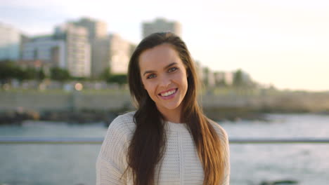 A-smiling-young-woman-on-a-seaside-holiday