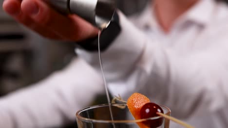 bartender preparing a cocktail