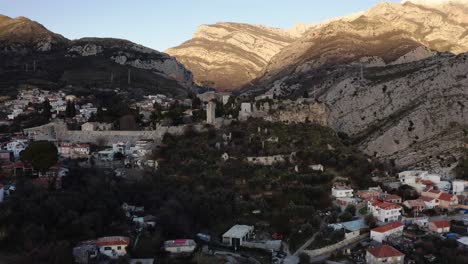 aerial - town of stravi bar and mountains, bar, crmnica, montenegro, reverse shot