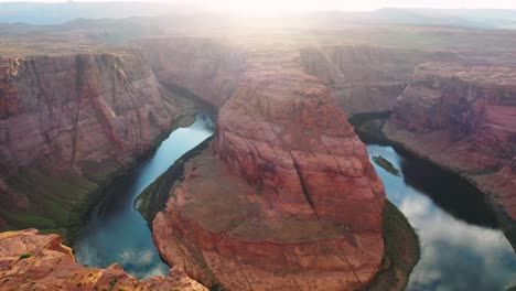 Cinematic-shot-,-aerial-view-of-Horseshoe-Bend,-a-horseshoe-shaped-canyon-high-above-the-Colorado-River-near-Lake-Powell-and-the-Grand-Canyon,-USA