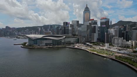 aerial of the hong kong convention and exhibition centre and city skyline, wan chai, hong kong, china