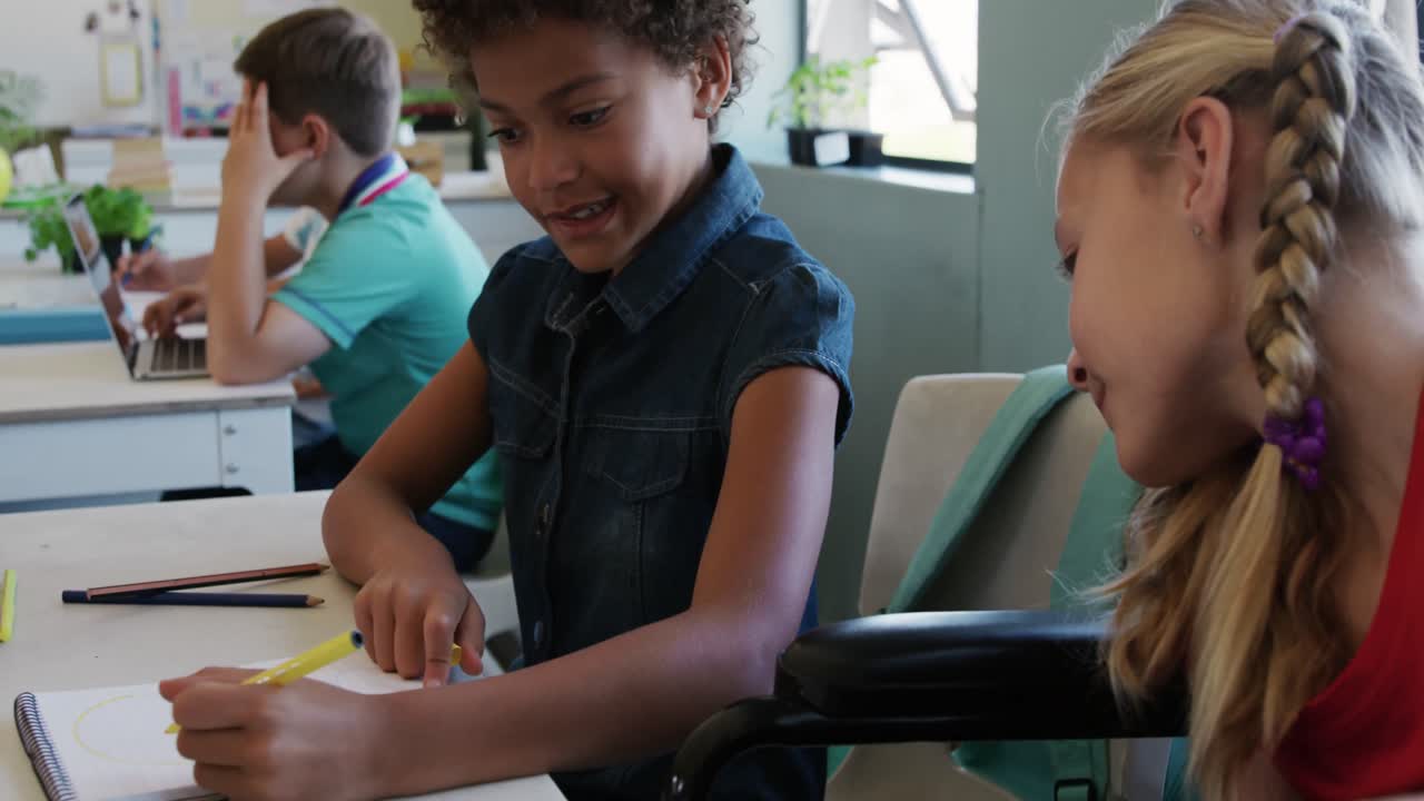 Two girls studying in the class