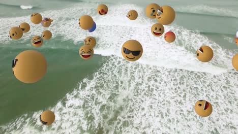 digital composition of multiple face emojis floating against aerial view of waves in the sea