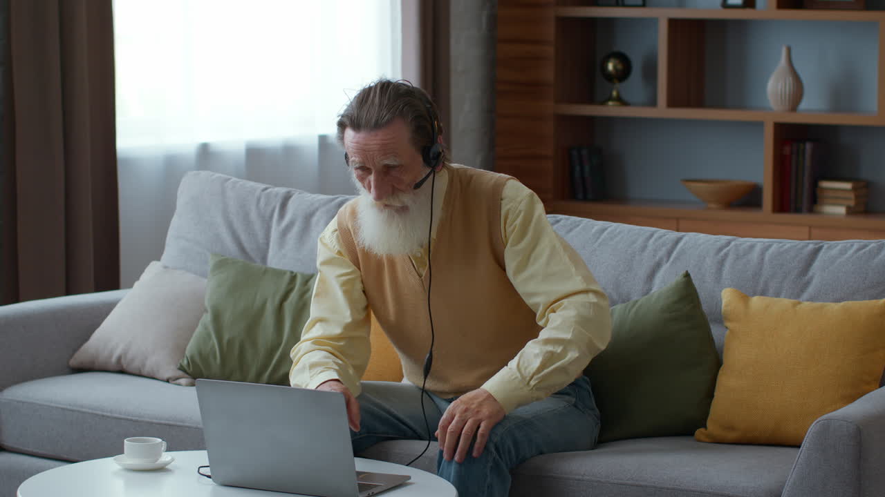 Senior man having a video call