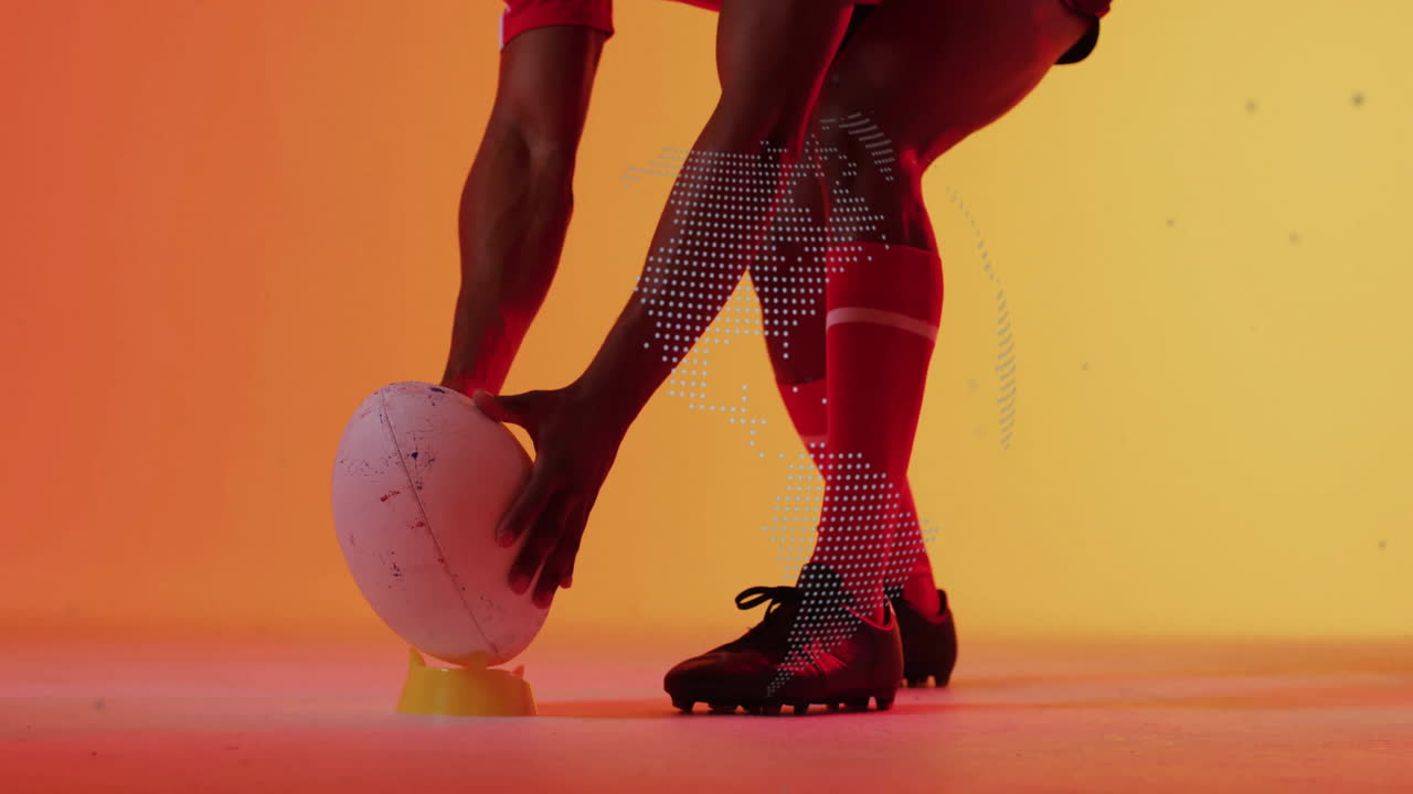 Placing rugby ball on tee, player with animation overlay on field