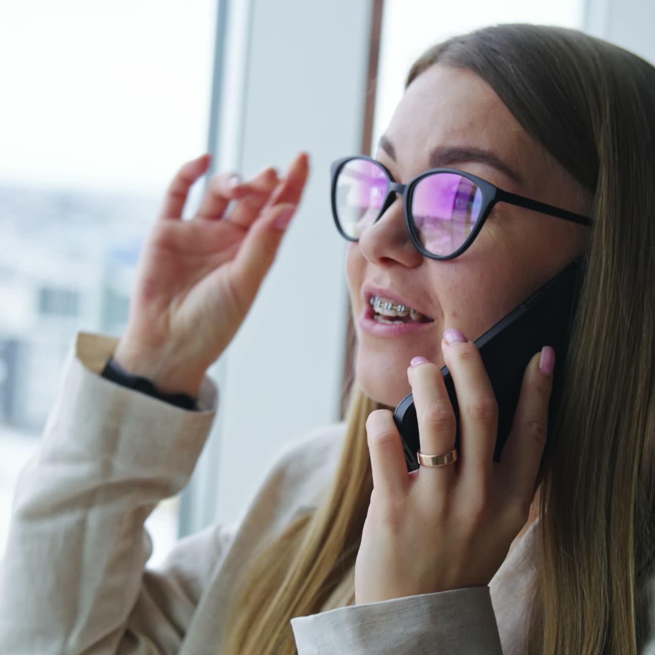 Cheerful young businesswoman have a phone call. Phone call talking entrepreneur