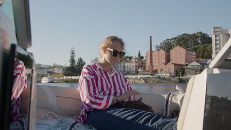 woman on a boat with a dog