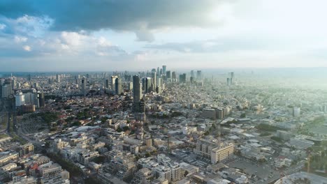 tel aviv skyline from drone. aerial shot long super wide horizon view. daytime sunset or early morning color sky coastline and office building in a modern tel aviv